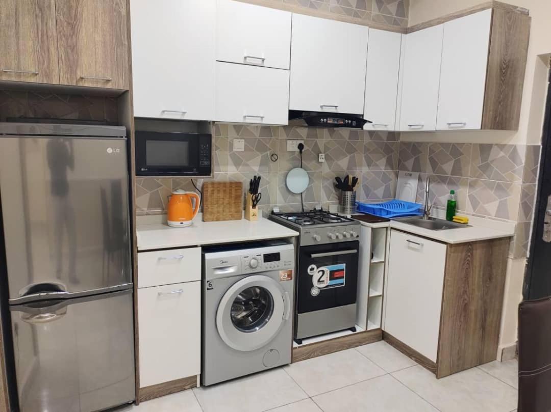 Apartamento The Leneade Abuja Exterior foto